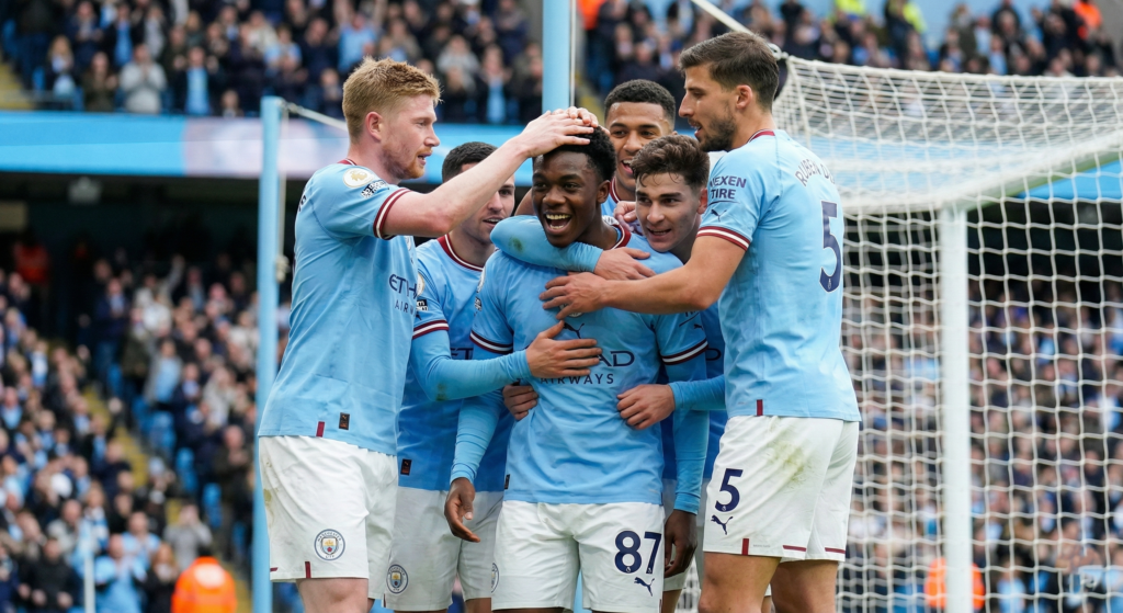Ryan Madu celebrating his debut goal for Manchester City.